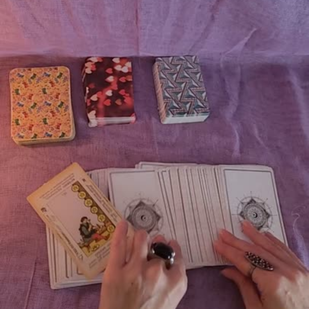 A video showing footages of card reading, tarot and crystals